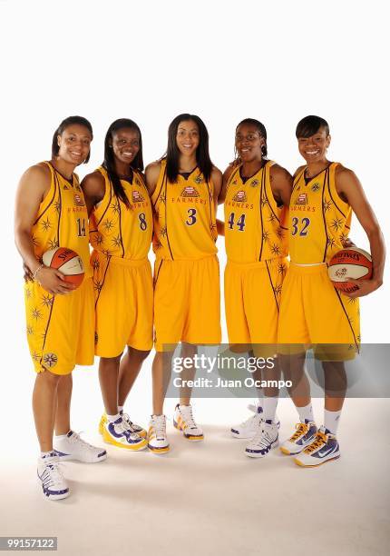 Lindsay Wisdom-Hylton, DeLisha Milton-Jones, Candace Parker, Tiffany Stansbury and Tina Thompson of the Los Angeles Sparks pose for a portrait during...