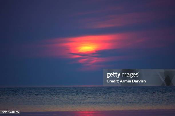 sunset on the beach - darvish stock pictures, royalty-free photos & images