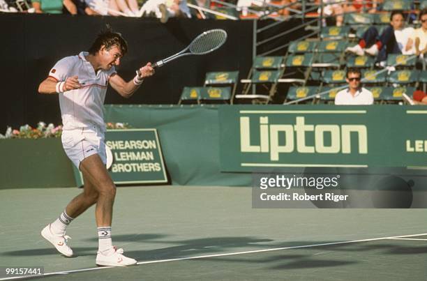 Jimmy Connors hits a forehand against Ivan Lendl during the finals of the 1986 Paine Webber Classic on March 24, 1986 in Fort Myers, Florida.