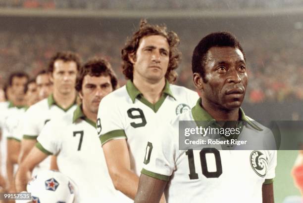 Tony Field, Giorgio Chinaglia and Pele of New York Cosmos look on before a game at Giants Stadium in East Rutherford, New Jersey, circa 1975-77.