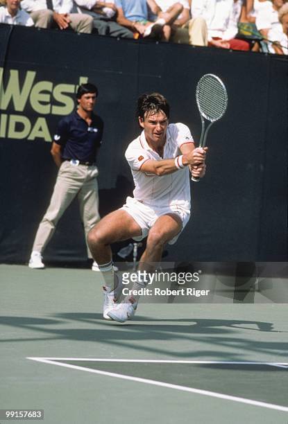 Jimmy Connors hits a backhand against Ivan Lendl during the finals of the 1986 Paine Webber Classic on March 24, 1986 in Fort Myers, Florida.