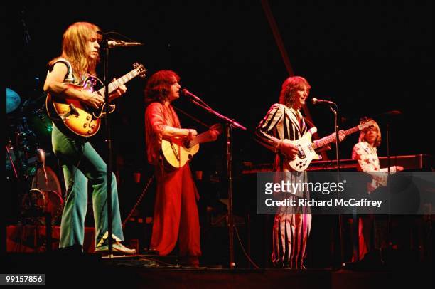Steve Howe, Jon Anderson, Chris Squire and Rick Wakeman of Yes perform live at The Oakland Coliseum in 1977 in Oakland, California.