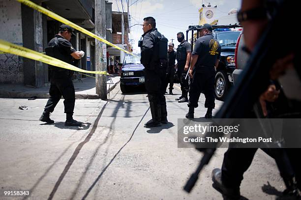 Michoacan In a small town northwest of the capitol, officers investigate the scene of a shooting where a police officer was killed. A SUV drove by...