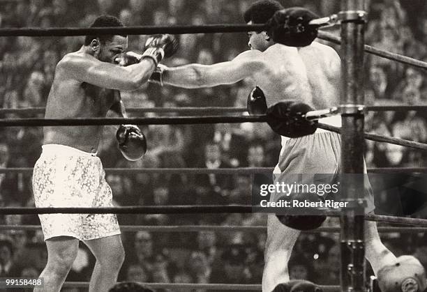 Muhammad Ali throws a left jab against Joe Frazier during the World Heavyweight Championship at Madison Square Garden on March 8, 1971 in New York...