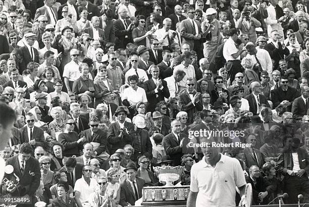 The crowd cheers as Chuck McKinley of the United States participates in the 1964 Davis Cup against Australia at Harold Clark Courts in Cleveland,...