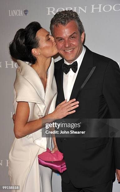 Actress Lyne Renee and actor Danny Huston arrive at the 'Robin Hood' After Party at the Hotel Majestic during the 63rd Annual Cannes International...