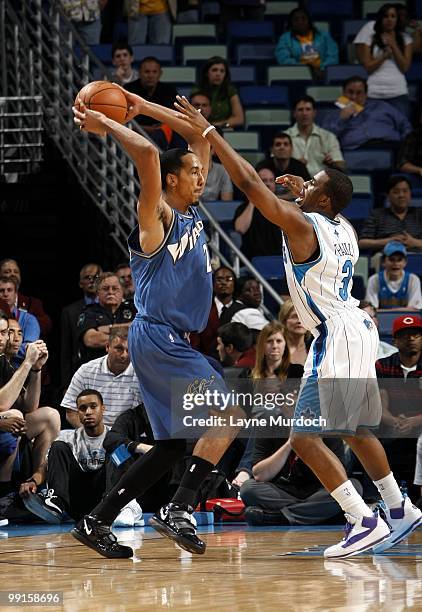 Shaun Livingston of the Washington Wizards holds the ball against Chris Paul of the New Orleans Hornets during the game at New Orleans Arena on March...