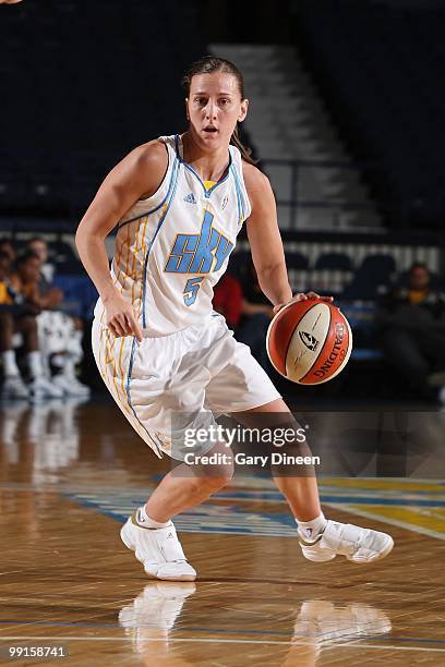 Erin Thorn of the Chicago Sky moves the ball against the Indiana Fever during the WNBA preseason game on May 10, 2010 at the All-State Arena in...