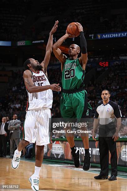 Ray Allen of the Boston Celtics takes a jump shot against John Salmons of the Milwaukee Bucks during the game on April 10, 2010 at the Bradley Center...