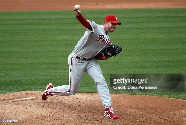 Starting pitcher Roy Halladay of the Philadelphia Phillies delivers against the Colorado Rockies at Coors Field on May 12, 2010 in Denver, Colorado....