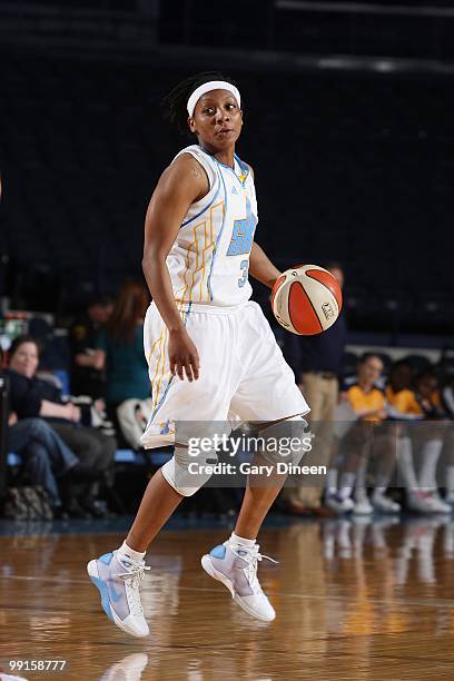 Dominique Canty of the Chicago Sky moves the ball against the Indiana Fever during the WNBA preseason game on May 10, 2010 at the All-State Arena in...