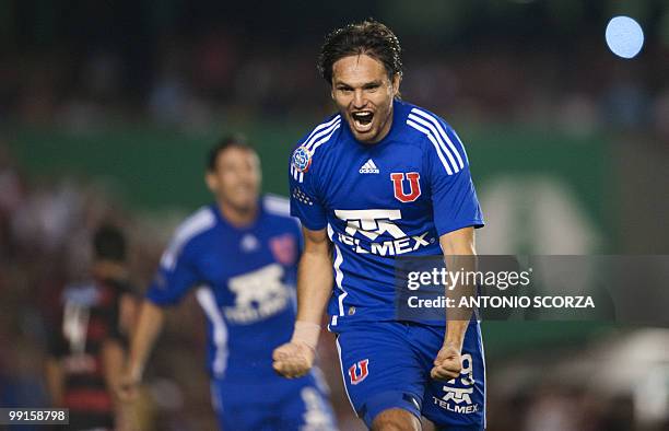 Universidad de Chile player Rafael Olarra celebrates after scoring the team's second goal against Flamengo during their Libertadores Cup quarterfinal...