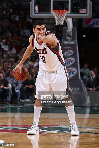 Carlos Delfino of the Milwaukee Bucks moves the ball against the Boston Celtics during the game on April 10, 2010 at the Bradley Center in Milwaukee,...