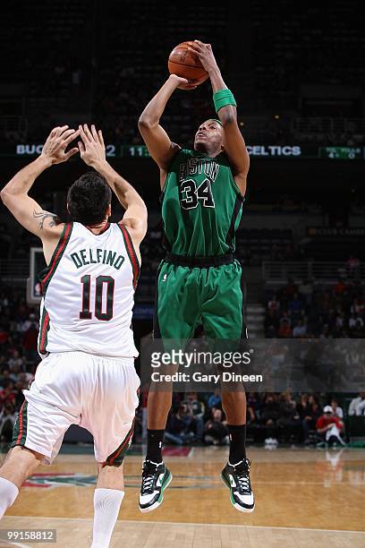 Paul Pierce of the Boston Celtics takes a jump shot against Carlos Delfino of the Milwaukee Bucks during the game on April 10, 2010 at the Bradley...