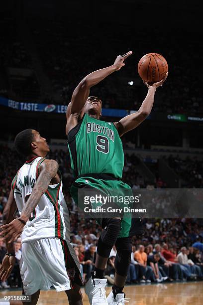 Rajon Rondo of the Boston Celtics takes the ball to the basket against Brandon Jennings of the Milwaukee Bucks during the game on April 10, 2010 at...