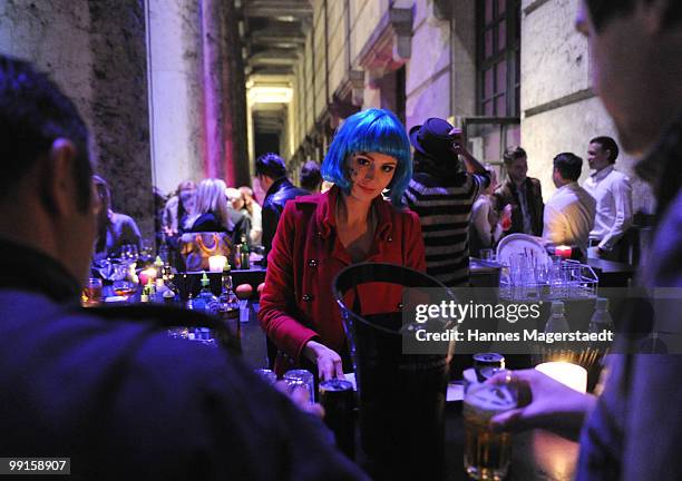 Waitress during the P1 grand opening of the Terrasse on May 12, 2010 in Munich, Germany.