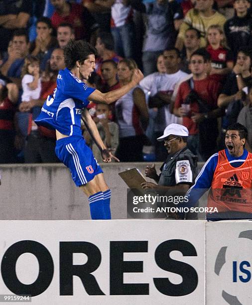 Universidad de Chile player Alvaro Fernandez celebrates his goal against Flamengo during their Libertadores Cup quarterfinal football match on May...