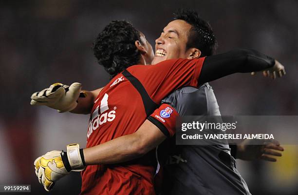 Universidad de Chile's goalkeeper Miguel Pinto celebrates the team's goal against Brazil's Flamengo during their Libertadores Cup quarterfinal...