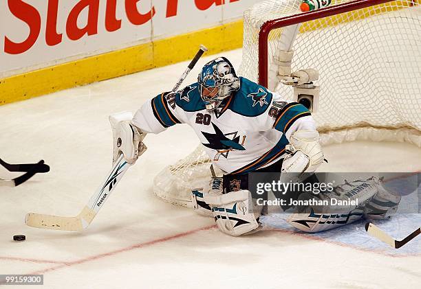 Evgeni Nabokov of the San Jose Sharks rejects a shot by the Chicago Blackhawks at the United Center on December 22, 2009 in Chicago, Illinois. The...