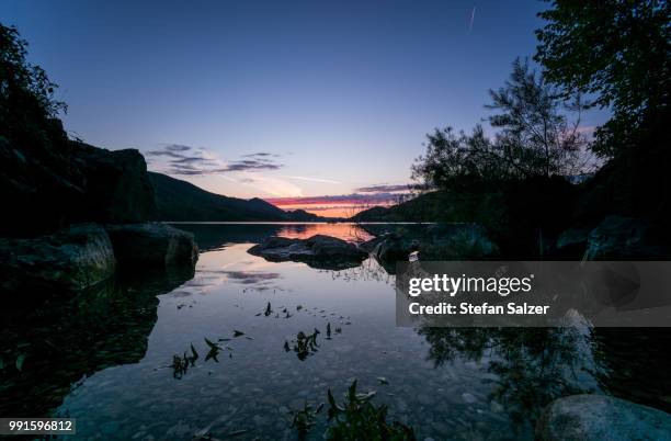 fuschlsee sunset - fuschlsee stock-fotos und bilder