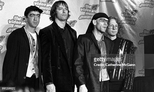 7th: REM Bill Berry, Peter Buck, Michael Stipe and Mike Mills pose for a group photo at the 12th Annual MTV Video Music Awards on September 7, 1995...