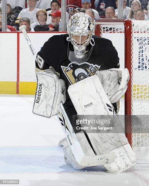 Marc-Andre Fleury of the Pittsburgh Penguins makes a save against the Montreal Canadiens in Game Seven of the Eastern Conference Semifinals during...
