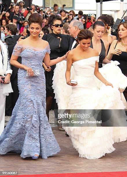 Actresses Aishwarya Rai Bachchan and Eva Longoria Parker attend the Opening Night Premiere of 'Robin Hood' at the Palais des Festivals during the...