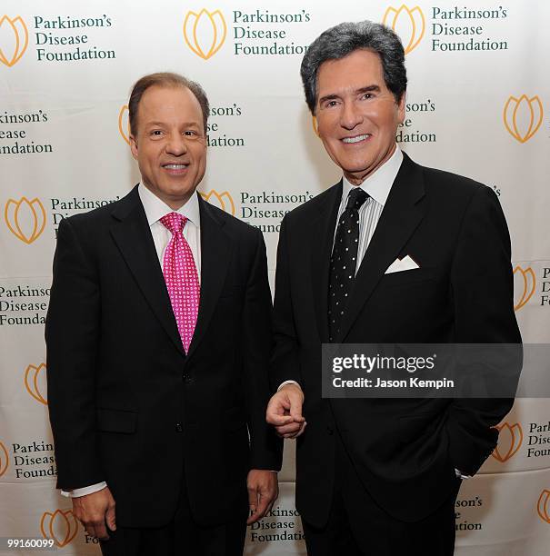 Personalities Nick Gregory and Ernie Anastos attend the Bal du Printemps gala to benefit The Parkinson's Disease Foundation at The Pierre Hotel on...