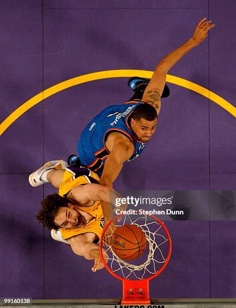 Pau Gasol of the Los Angeles Lakers shoots over Thabo Sefolosha of the Oklahoma City Thunder during Game Five of the Western Conference Quarterfinals...