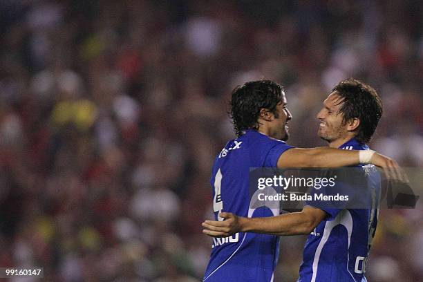 Rafael Olara of Universidad de Chile celebrates a scored goal with a team mate during a match as part of Libertadores Cup at Maracana Stadium on May...