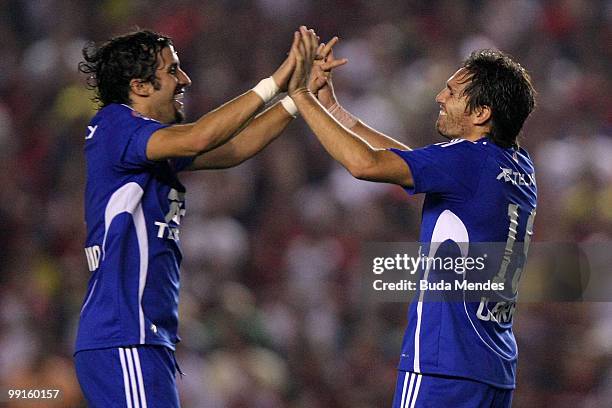 Rafael Olara of Universidad de Chile celebrates a scored goal with a team mate during a match as part of Libertadores Cup at Maracana Stadium on May...