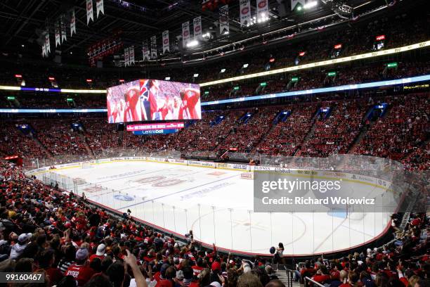 Fans watch Game Seven of the Eastern Conference Semifinals between the Montreal Canadiens and the Pittsburgh Penguins on the Bell Centre video system...