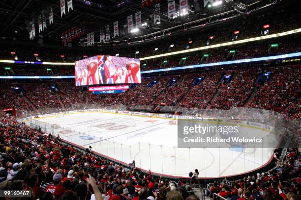 Fans watch Game Seven of the Eastern Conference Semifinals between the Montreal Canadiens and the Pittsburgh Penguins on the Bell Centre video system...