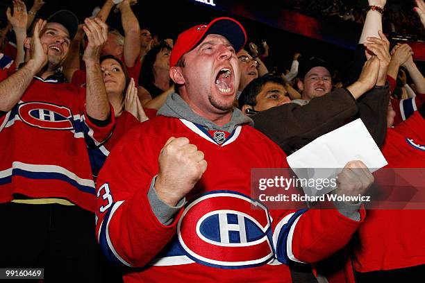 Fan reacts to the second goal by the Montreal Canadiens of Game Seven of the Eastern Conference Semifinals between the Montreal Canadiens and the...