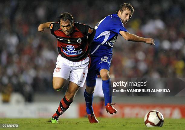 Brazil's Flamengo Dejan Petkovic vies for the ball with Universidad de Chile's Felipe Seymour during their Libertadores Cup quartefinal football...