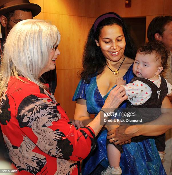 Singer/Songwriter Emmylou Harris and The Carolina Chocolate Drops Rhiannon Giddens and child at the 2010 Americana Honors & Awards nominee...