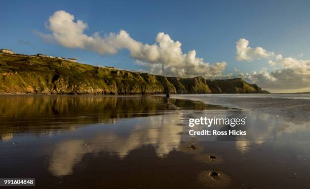 rhossili sunset, gower peninsula - rhossili stock pictures, royalty-free photos & images