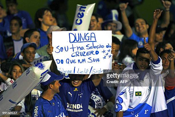 Cruzeiro football team fans hold a sign mocking on Brazil's head coach Dunga before the start of the Cruzeiro vesrus Sao Paulo Libertadores...