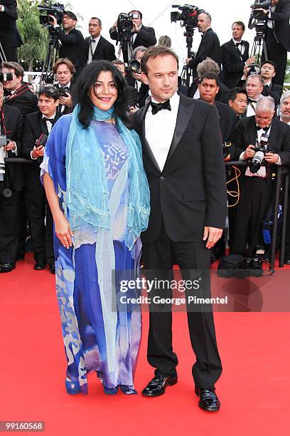 Iranian director Marjane Satrapi and French actor Vincent Perez attend the Opening Night Premiere of 'Robin Hood' at the Palais des Festivals during...