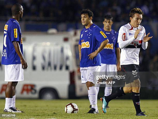 Sao Paulo's player Dagoberto celebrates after scoring against Cruzeiro during their Libertadores quarterfinal football match in Belo Horizonte, Minas...