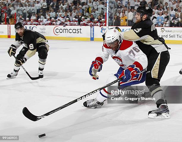 Subban of the Montreal Canadiens moves the puck in front of the defense of Alex Goligoski of the Pittsburgh Penguins in Game Seven of the Eastern...