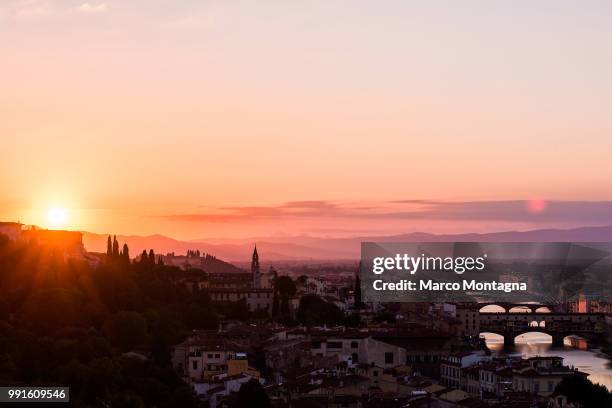 florence at sunset - montagna stock pictures, royalty-free photos & images