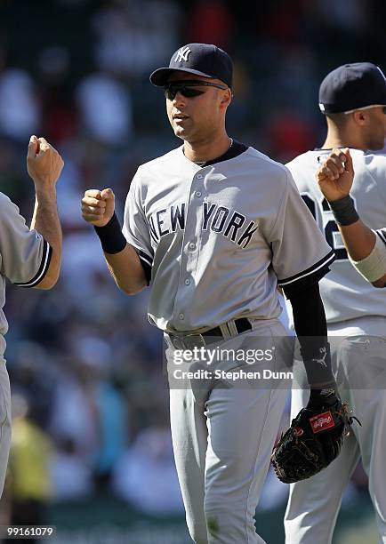 Derek Jeter of the New York Yankees celebrates with teammates after the game against the Los Angeles Angels of Anaheim on April 24, 2010 at Angel...