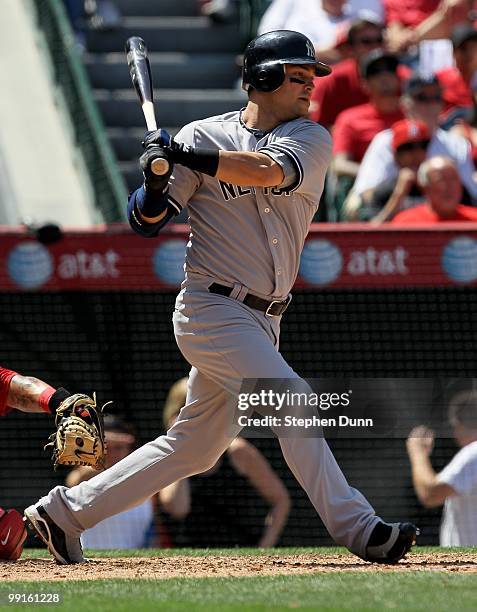 Nick Swisher of the New York Yankees bats against the Los Angeles Angels of Anaheim on April 24, 2010 at Angel Stadium in Anaheim, California. The...