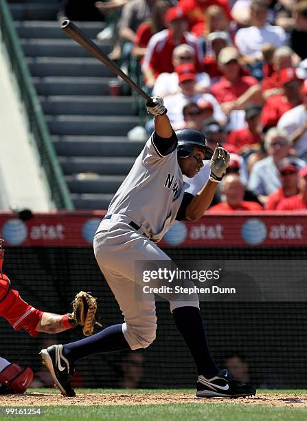 Curtis Granderson of the New York Yankees bats against the Los Angeles Angels of Anaheim on April 24, 2010 at Angel Stadium in Anaheim, California....