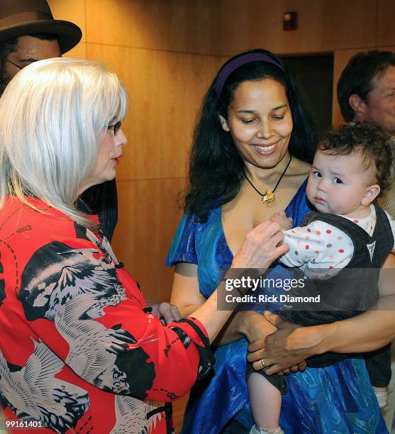 Singer/Songwriter Emmylou Harris and The Carolina Chocolate Drops Rhiannon Giddens and child at the 2010 Americana Honors & Awards nominee...