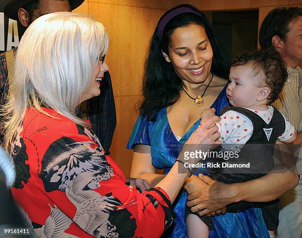 Singer/Songwriter Emmylou Harris and The Carolina Chocolate Drops Rhiannon Giddens and child at the 2010 Americana Honors & Awards nominee...
