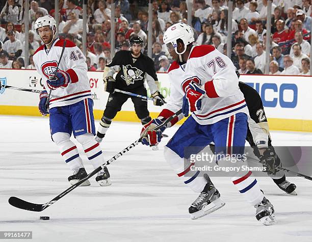 Subban of the Montreal Canadiens moves the puck in front of Dominic Moore against the Pittsburgh Penguins in Game Seven of the Eastern Conference...