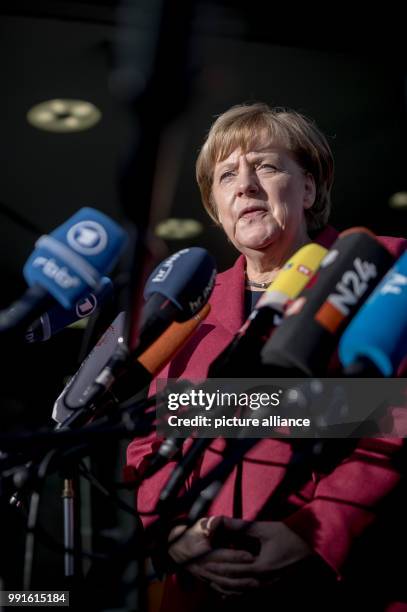 German Chancellor Angela Merkel arriving to the CDU's headquarters for a further round of exploratory talks in Berlin, Germany, 17 November 2017....