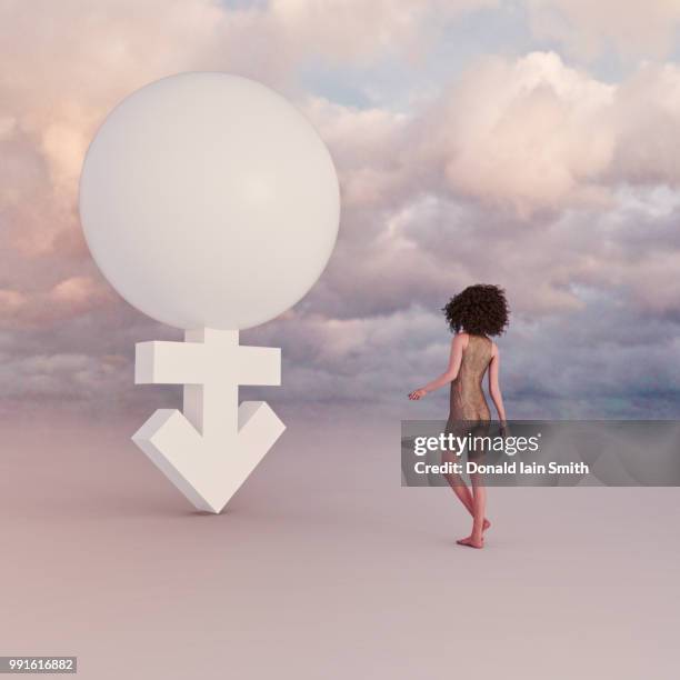 young female standing beside transgender symbol - transgender awareness week stock pictures, royalty-free photos & images